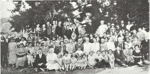 Bahá’í Feast August 2, 1925, celebrating the seventieth birthday of Mr. John D. Bosch at Geyserville, California. Mr. Bosch is the gentleman with white beard seated to right of center.