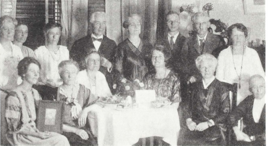 First Bahá’í Feast held in Auckland , New Zealand, January, 1923. Mr. and Mrs. Dunn in center standing.